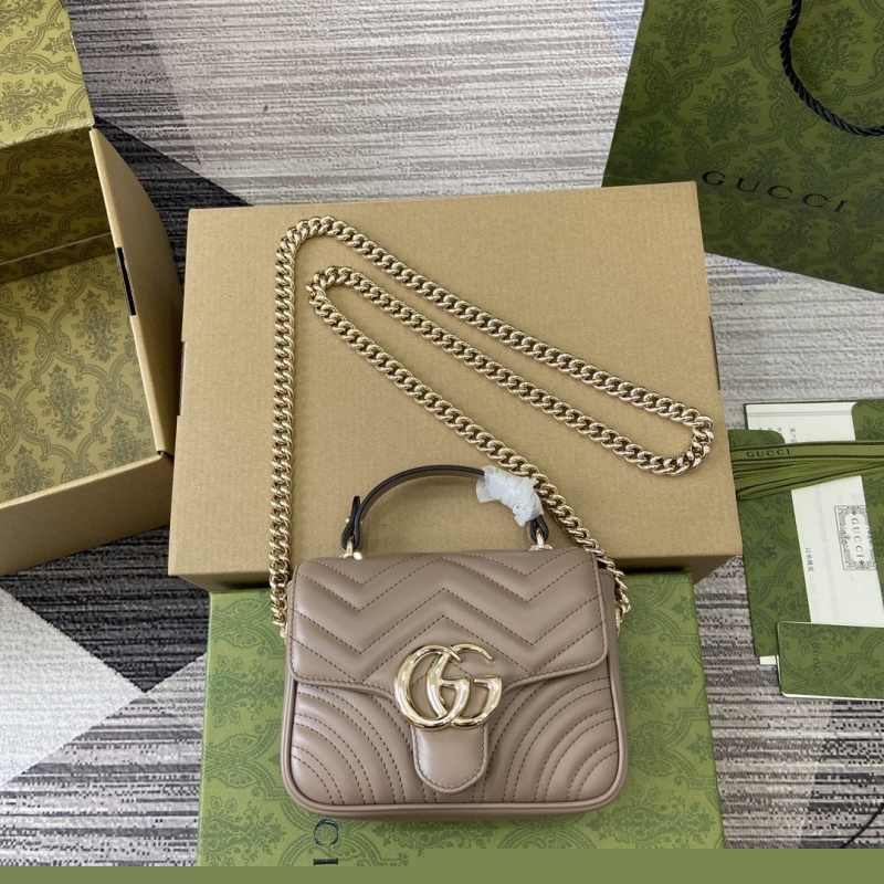 G*u*i top handle bags